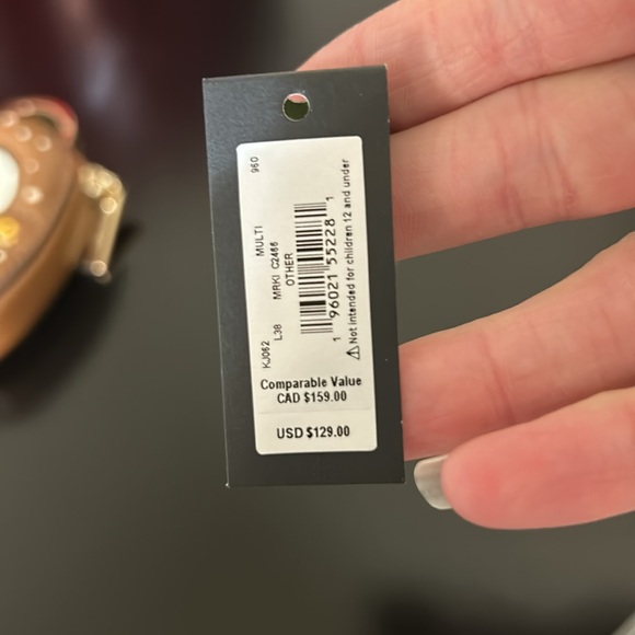 Kate Spade Brown Pretzel Keychain Bag - Picture 5 of 9